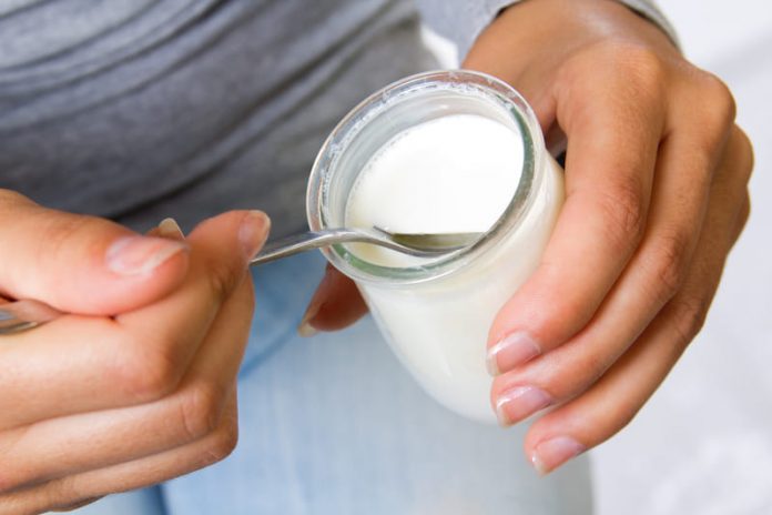 close-up-female-eating-yogurt (1) yogurt